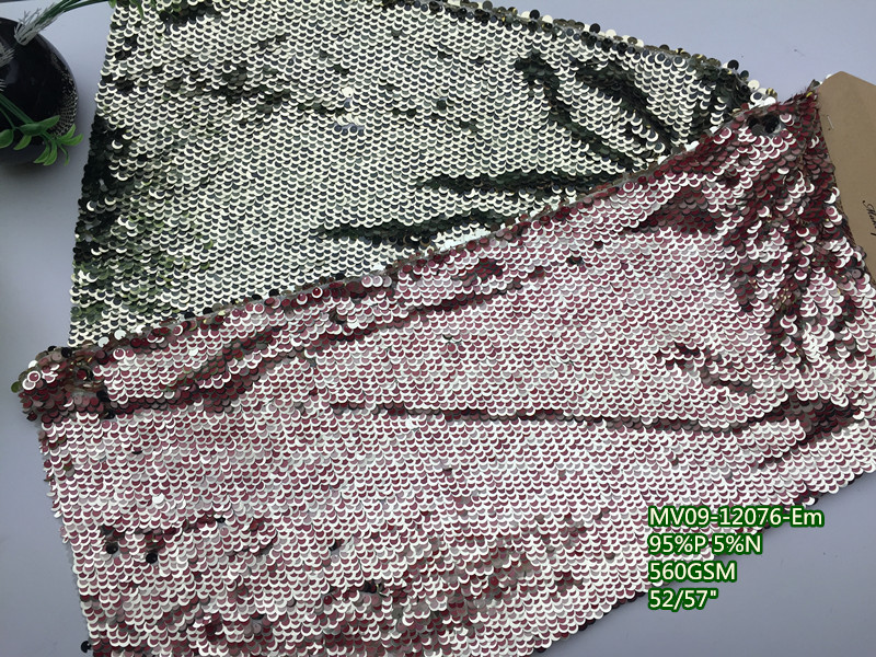 MV09-12076-Em